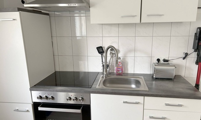 Niddatal Apartment | Mini Apartment mit Garten und Küche