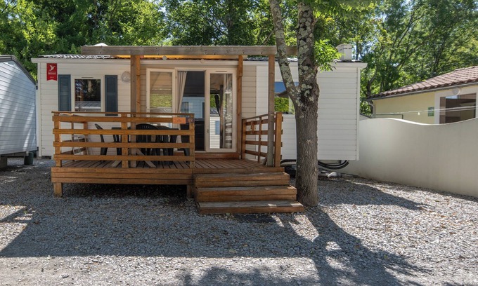 Lavilledieu RV Rental | Mobile Home 'Confort B - 1-5 Persons' with Shared Pool, Private Terrace and Communal Garden