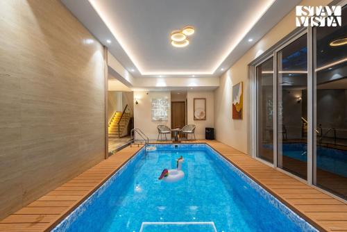 St.Stanislaus Villa Villa | Mocha House with Indoor Pool, BBQ & Bonfire at Lonavala by StayVista