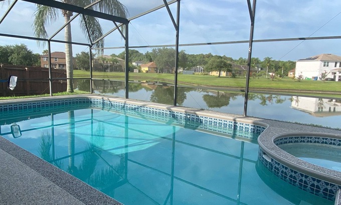 Crescent Lakes Villa | Modern 5 bedroom villa with private pool/lake view/30 mins from Disney