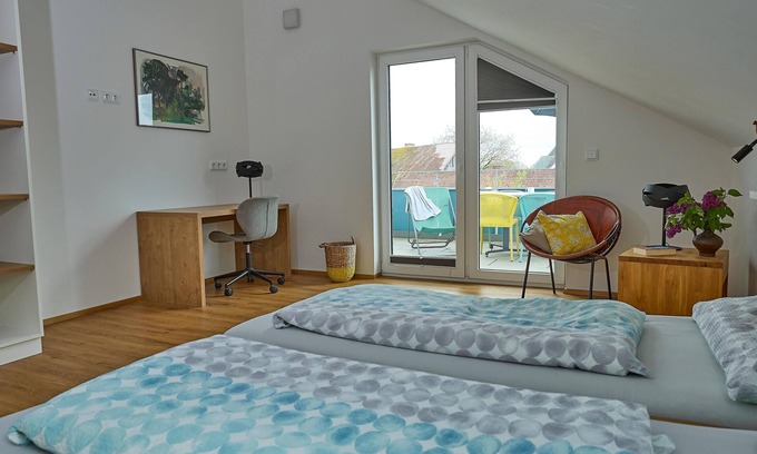 Waggershausen Apartment | Modern, cozy penthouse with large south-facing terrace and mountain views.