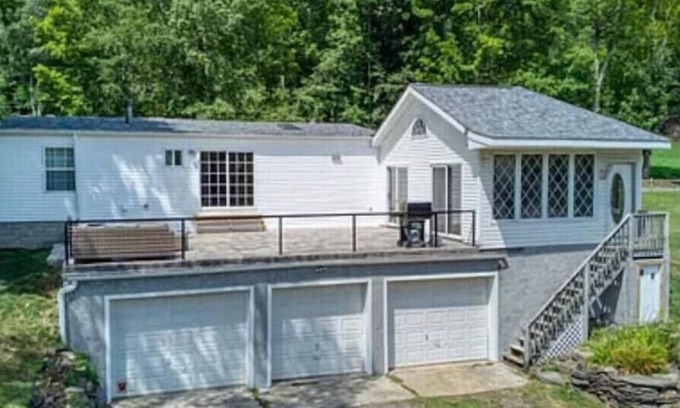 Charlotteville House | Modern home overlooking private lake and mountains. Pet Friendly!