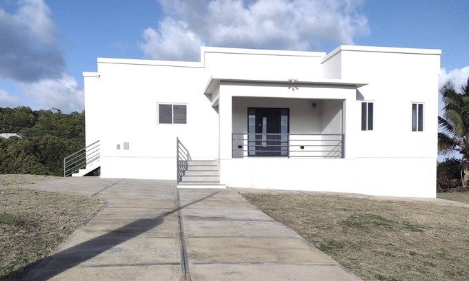 St. Andrew House | Modern Hope City House With Ocean Views