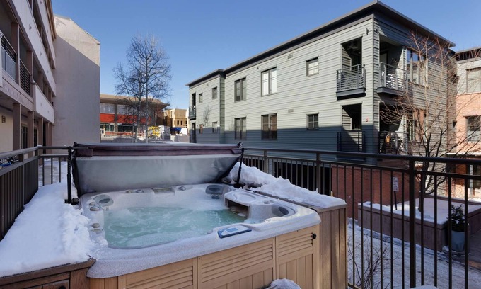 Aspen Condo | Mountain Views On Main St Aspen. Walk to Everything! Balcony, Gas FP, Elevator, Covered Parking, HT