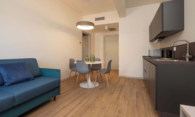 Ovest Apartment | MuBra Apartments - Unit 301