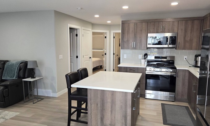 Medicine Hat Apartment | New! 2 Bedroom Ground Floor Unit With Parking, Separate Entrance. Full kitchen.