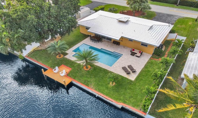 North Corals House | New! Waterfront Heated Pool & Jacuzzi 2 mi to Beach - Fishing Pier Relaxing SPA & Hammock