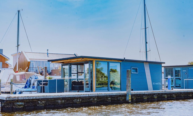 Municipality of Uitgeest Boat Rental | Nice houseboat with waterfront terrace