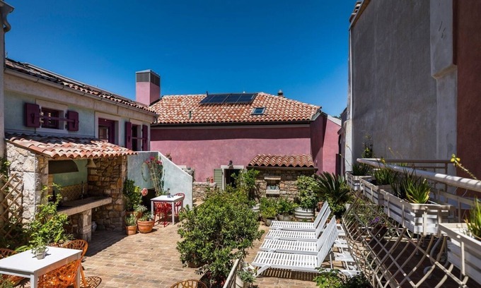 City Center Apartment | Nicely and romantic decorated Belle epoque suite with terrace, Wifi, sauna and bikes .