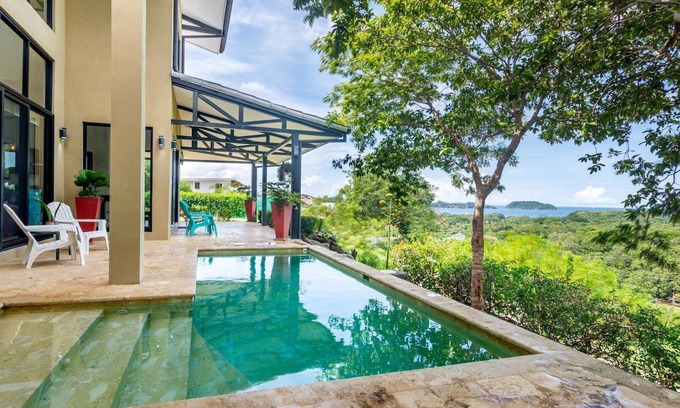 Potrero House | Nostalgic Retro Home on Luxurious Lot with a Private Infinity Pool and Ocean Views