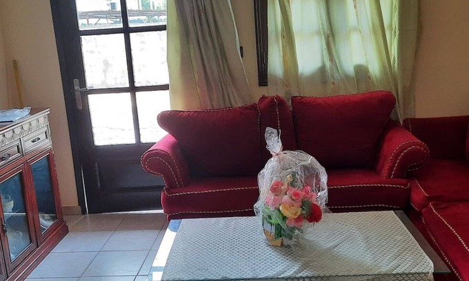 Libreville Apartment | Nzecy Appart. A studio with a velvety, air-conditioned living room.