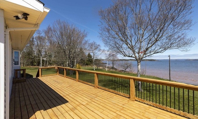 Saint John House | Oceanfront Bungalow on the Bay. 3 Bed 2 Bath with a large treed lot.