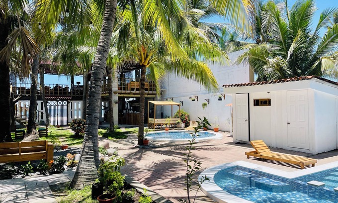 Playa San Blas Hotel | Oceanfront paradise steps away from the surf.