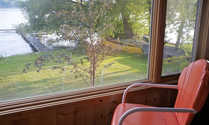 Lake Ripley Cabin | On the water! Rain guarantee. Boat lift. AC. Pontoon boat, SUP's, Kayaks, canoe.