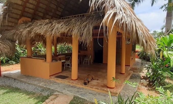 Las Galeras House | Palm-roofed house in the second row to the sea