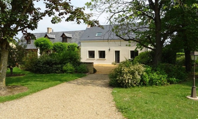 Saint-Gervais-en-Belin Cottage | Peaceful Family Retreat with Bikes and Outdoor Games