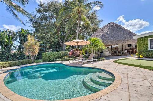 Florida North Atlantic Coast House | Poolside Paradise with Tropical Hut in Palm Beach