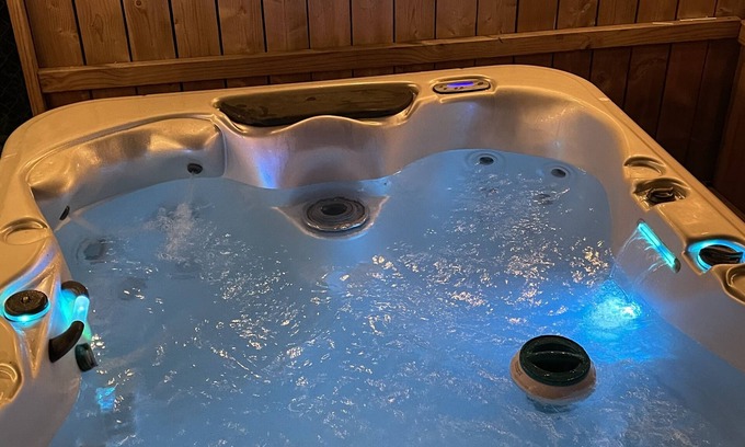 Mountain Iron Apartment | "Prime Location Stylish 1Bedroom with Hot Tub Access, across street from Legion