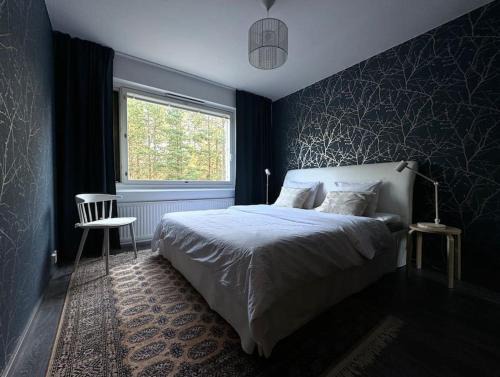 Oulu Apartment | Rauhallinen ja tilava ylimmän kerroksen neliö