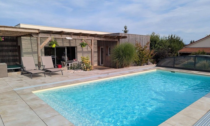 Dounoux Cottage | Refined holiday home with terrace and shared pool