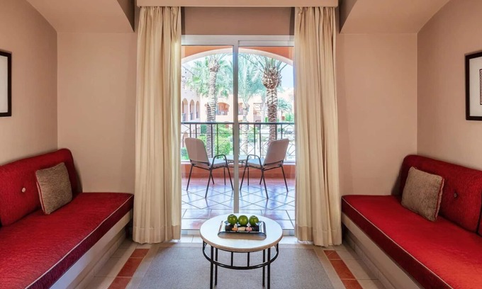 Makadi Bay Resort | Relax in a Calm Room with Outdoor Pool Near Makadi Water World Aqua Park