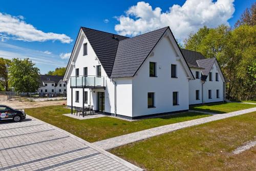 Lobbe Apartment | Rex Rugia FeWo15-5 mit Schwimmbad und Saunanutzung im AHOI-Erlebnisbad Sellin