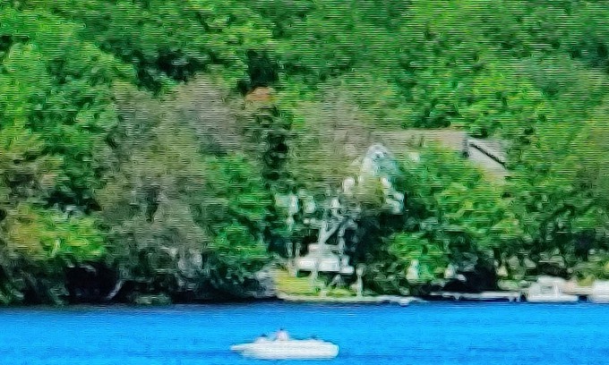 Lake Harmony Resort | Romantic getaway- hot tub and fireplace with a picturesque view of Lake Harmony!