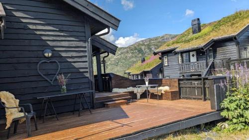 Tyinkrysset House | Romslig leilighet sommer og vinter