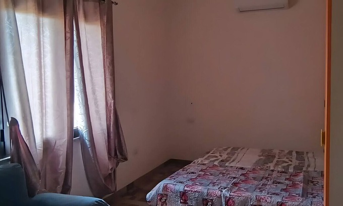 Villacidro Apartment | Room 'Camera - Muru Mannu' with Mountain View, Wi-Fi and Air Conditioning