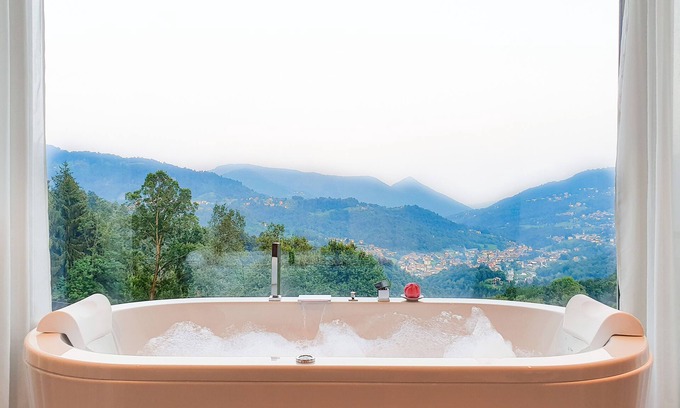 Rota d'Imagna Apartment | Rota Apartments - bilocale NUVOLA con jacuzzi in camera e vista mozzafiato