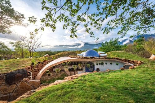 Murbad Villa | SaffronStays AsanjA Titaly, Murbad - hobbit inspired earth-shelter home with plunge pool