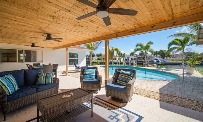 Bal Harbour House | Saltwater canal front 4 bedroom tropical home with private pool and boat dock