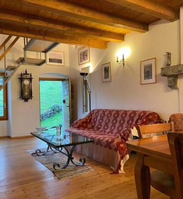 Anzonico Apartment | Santorini by Quokka 360 - Blue curtains in the Alps