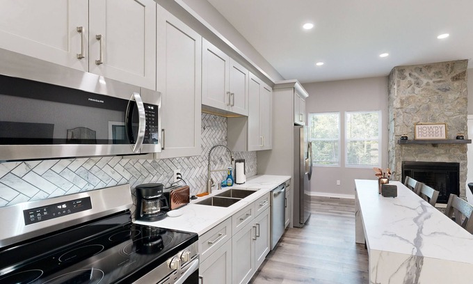 Roaring River House | Scenic Home- Close to water activities with fireplace, W/D, & AC