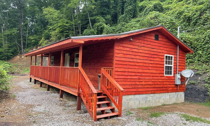Lejunior Cabin | Secluded Cabin with a mountain view, hot tub, full kitchen, and living room.