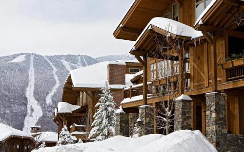 Spruce Peak House | Ski in Ski out 4 Bedroom Spruce Peak Lodge Luxury Mountain Cabin By Stowe Mountain Rentals