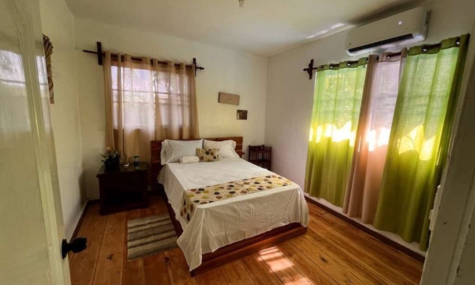 Bonao Villa | Spacious 6-bedroom villa in Tranquil Monseñor Nouel with AC