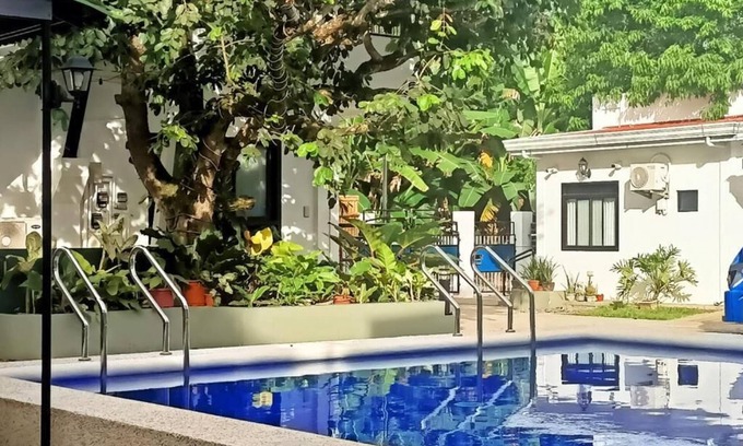 Tawala Apartment | Spacious apartment with separate toilet, sofa bed in living room.