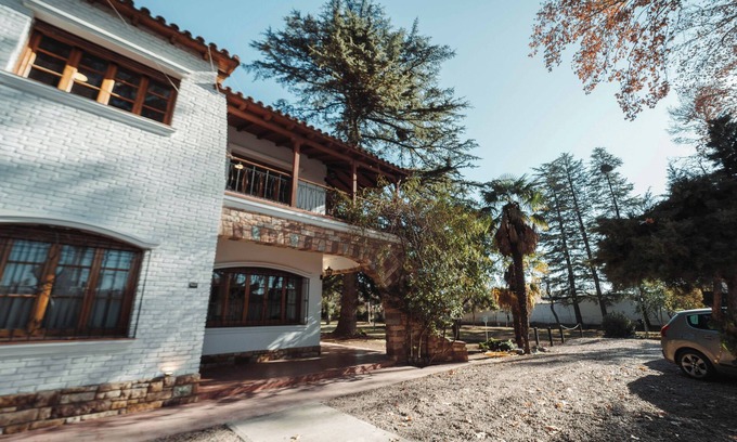 Chacras de Coria Ski Chalet | Spacious chalet with 9 bedroom,AC, WiFi, pool, 8000m2 park in Chacras de Coria