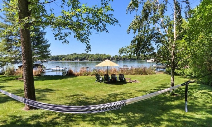 Whitewater House | Spacious, Upscale Whitewater Lake Home |200+ Ft of Lake Frontage |Swim Deck |Docks |Screened Porch