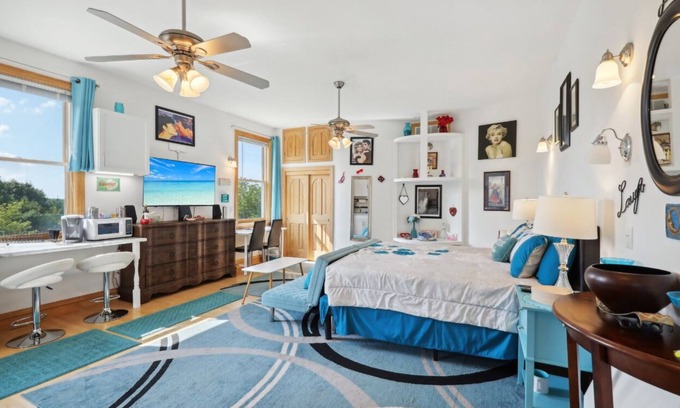 Fort Atkinson Villa | Starlight Tower Hot Tub King Suite with 8-Jet Massage Shower by RedAwning