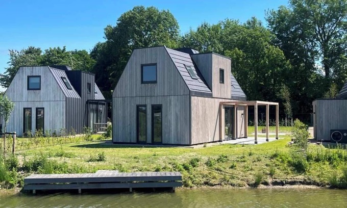 Oude-Tonge House | Stay in comfort in this modern, recently built holiday home with a beautiful view of the water from