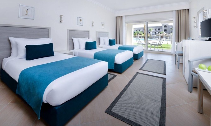 Soma Bay Hotel | Steps from Private Beach, Dive Center, Pool & Vibrant Evening Entertainment