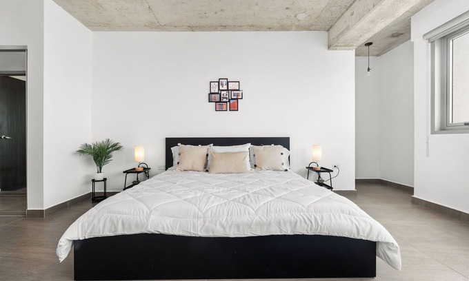 Condado Apartment | Steps to Condado Beach! Relax by the pool with free parking & all modern comforts