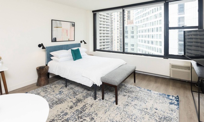 Rush and Division Apartment | Steps to Mich Ave | Chic Suite with City View | Zencity