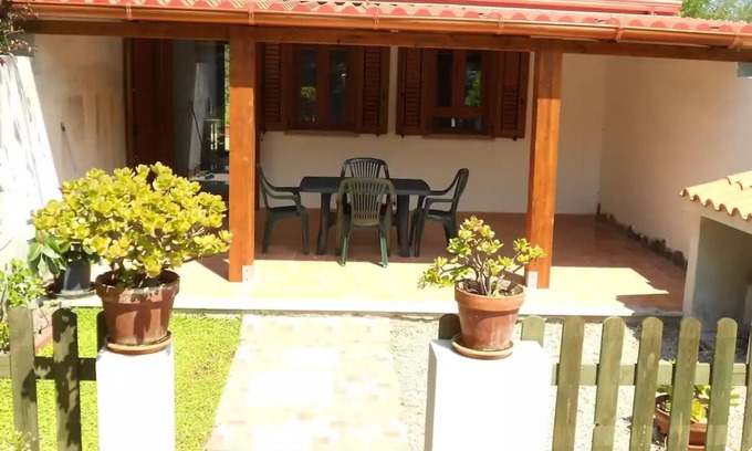 Calasetta Cottage | Studio apartment with patio in front and back terrace with veranda