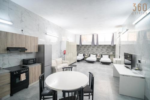 Tarxien Apartment | Studio with Full Kitchen & 3 Beds in Tarxien