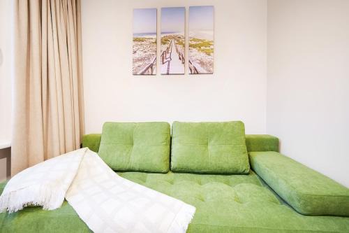 Vilnius Apartment | Stylich white salad studio near the city center