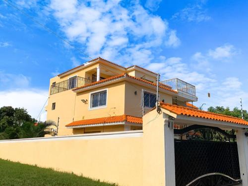 Sabana Palenque Villa | Stylish and Spacious 4BR 5BA 5 minutes from the beach