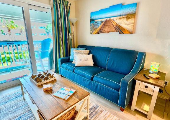 Galveston Apartment | Sun Splashed Condo! Steps to Beach and 2 Pools Galveston Island